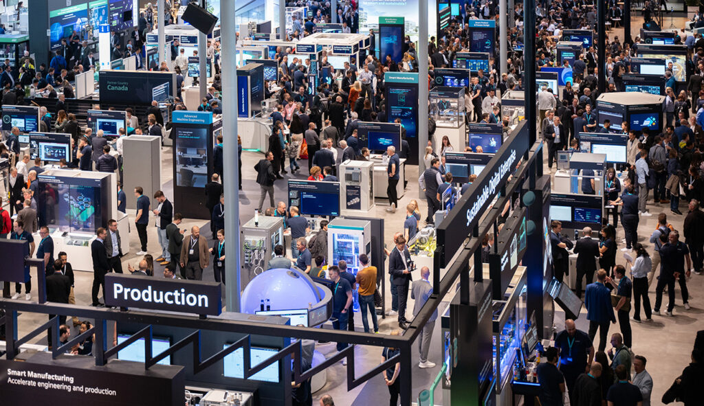 Hannover Messe 2026 industrial exhibition hall with robots and visitors